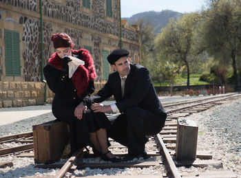 Young couple sitting on seat