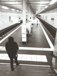 People on railroad station platform