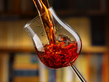Close-up of red wine glass