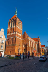 Low angle view of cathedral against clear blue sky