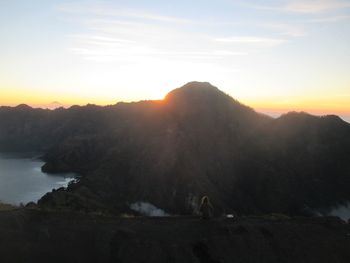 Scenic view of mountains against sky during sunset