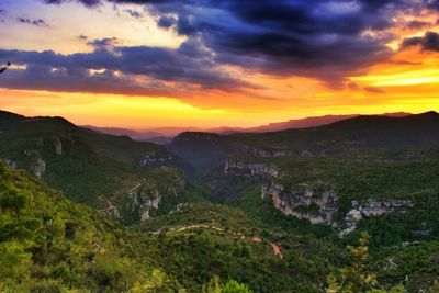 Scenic view of mountains at sunset