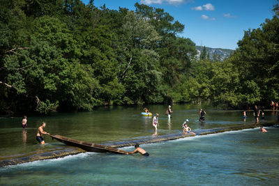 People in river