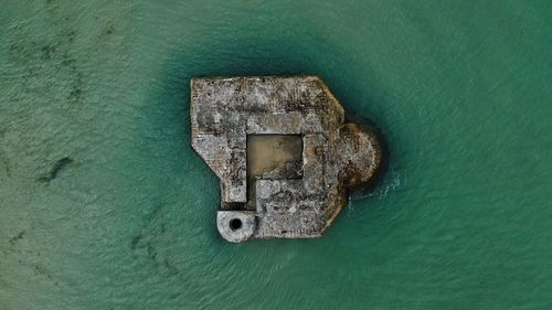 High angle view of old metal door