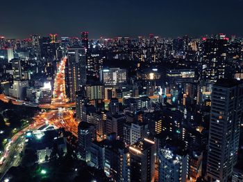 Illuminated cityscape against sky at night from tokyo tower