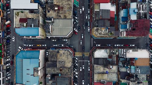 Aerial view of road amidst buildings in city