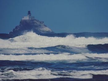 Waves splashing on rocks