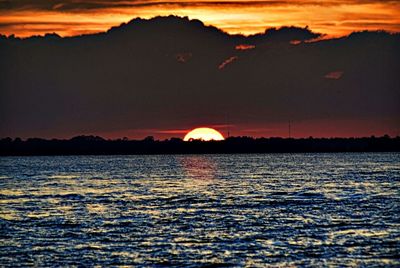 Scenic view of sunset over sea