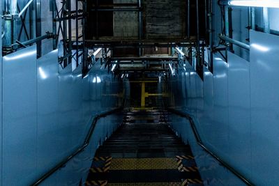 High angle view of illuminated escalator