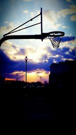 Silhouette of building at sunset