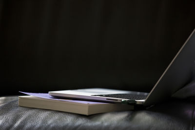 Close-up of laptop on table