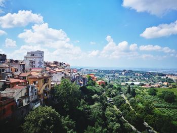 High angle shot of townscape against sky