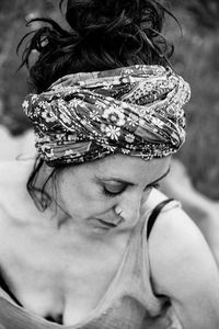 High angle view of mid adult woman wearing headscarf standing outdoors