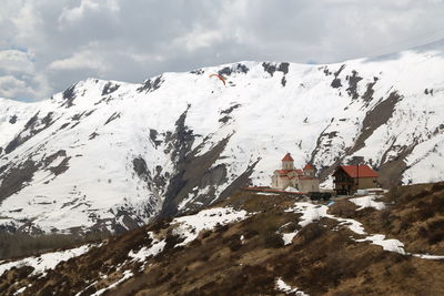 Snow covered mountain against sky