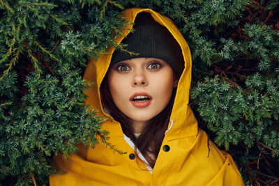 Portrait of young woman in forest