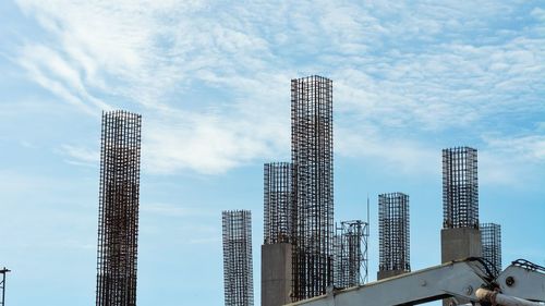 Low angle view of unfinished buildings against sky