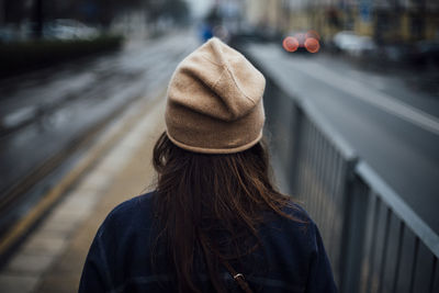 Rear view of woman wearing hat