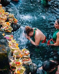 Woman swimming in sea