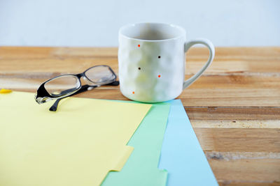 Close-up of coffee cup on table