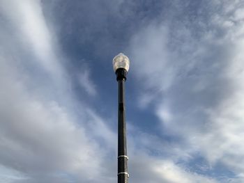 Low angle view of smoke stack against sky