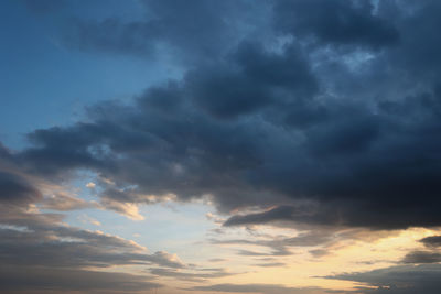 Low angle view of cloudy sky during sunset