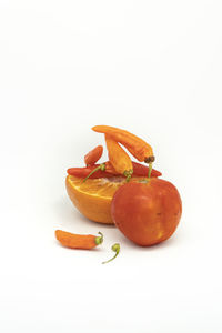 Close-up of orange against white background