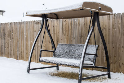 Empty chairs on snow