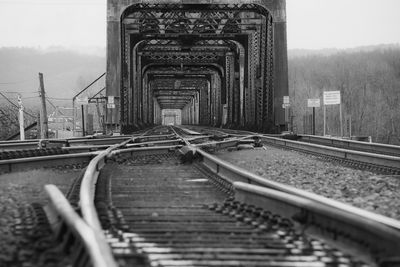 Surface level of railroad tracks against bridge