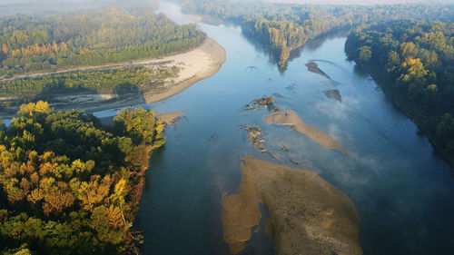 High angle view of lake amidst trees