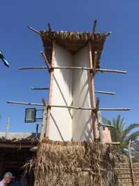 Low angle view of built structure against blue sky