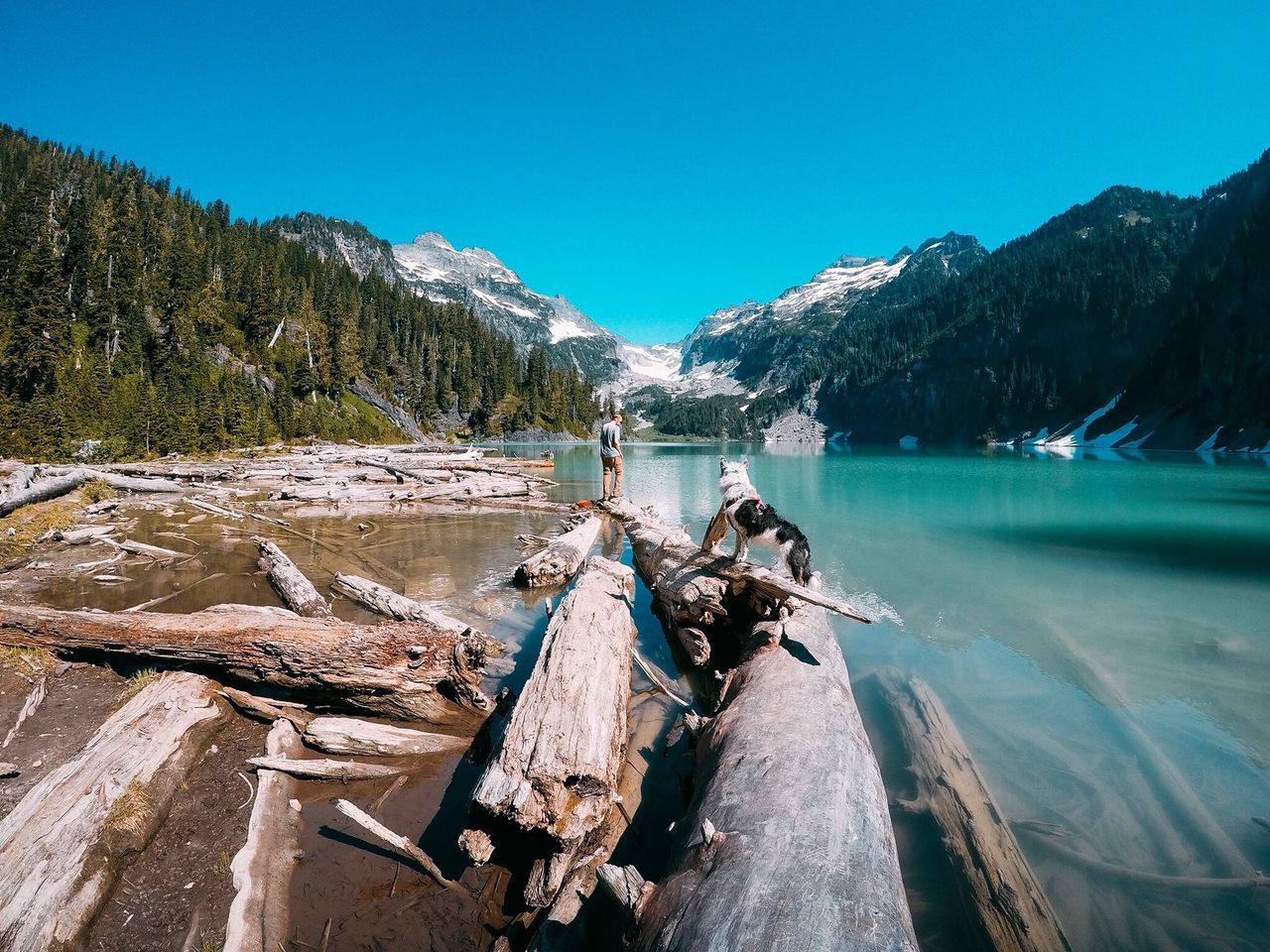 PANORAMIC SHOT OF MOUNTAINS AGAINST CLEAR BLUE SKY