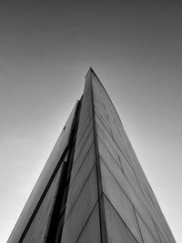 Low angle view of skyscraper against clear sky