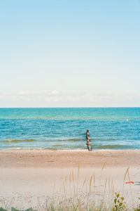 Scenic view of sea against clear sky