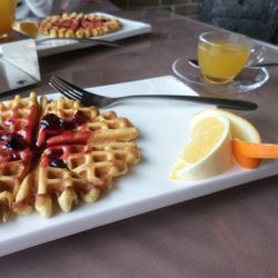 Close-up of breakfast served on table