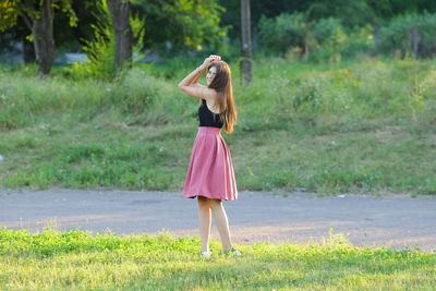 Woman standing on field