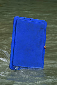 Blue float in river