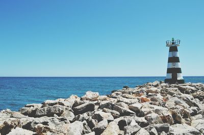 Scenic view of sea against clear sky
