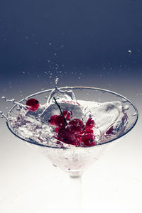 Close-up of water splashing against black background