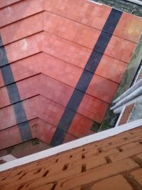 Close-up of tiled floor against sky