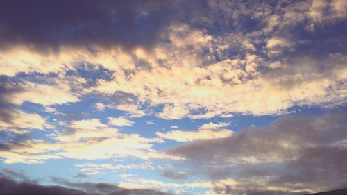 Low angle view of dramatic sky during sunset