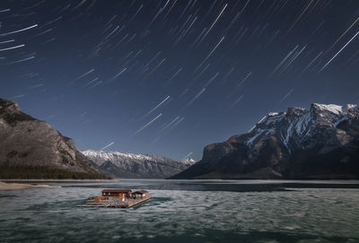 Scenic view of mountain against sky at night