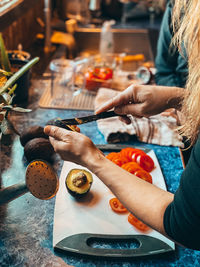 High angle view of woman preparing food