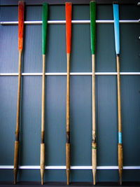 Full frame shot of multi colored arrows on rack