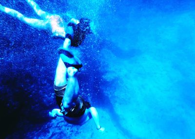 Woman swimming in sea