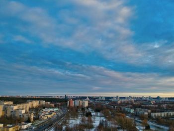 High angle view of buildings in city against sky