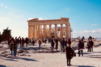 Group of people in front of historical building
