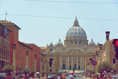 Tourists in front of building