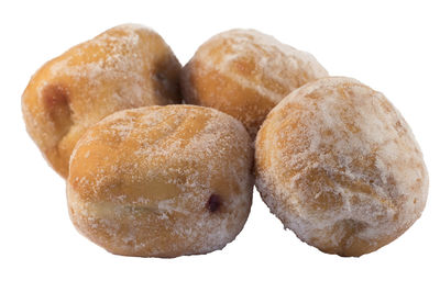 Close-up of bread against white background