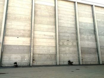 Men on wall