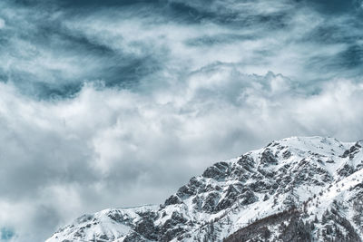 Snowcapped mountains against sky